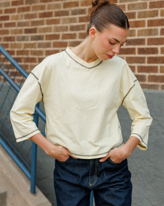 Model wearing the Sønderhaus August Tee in Yellow