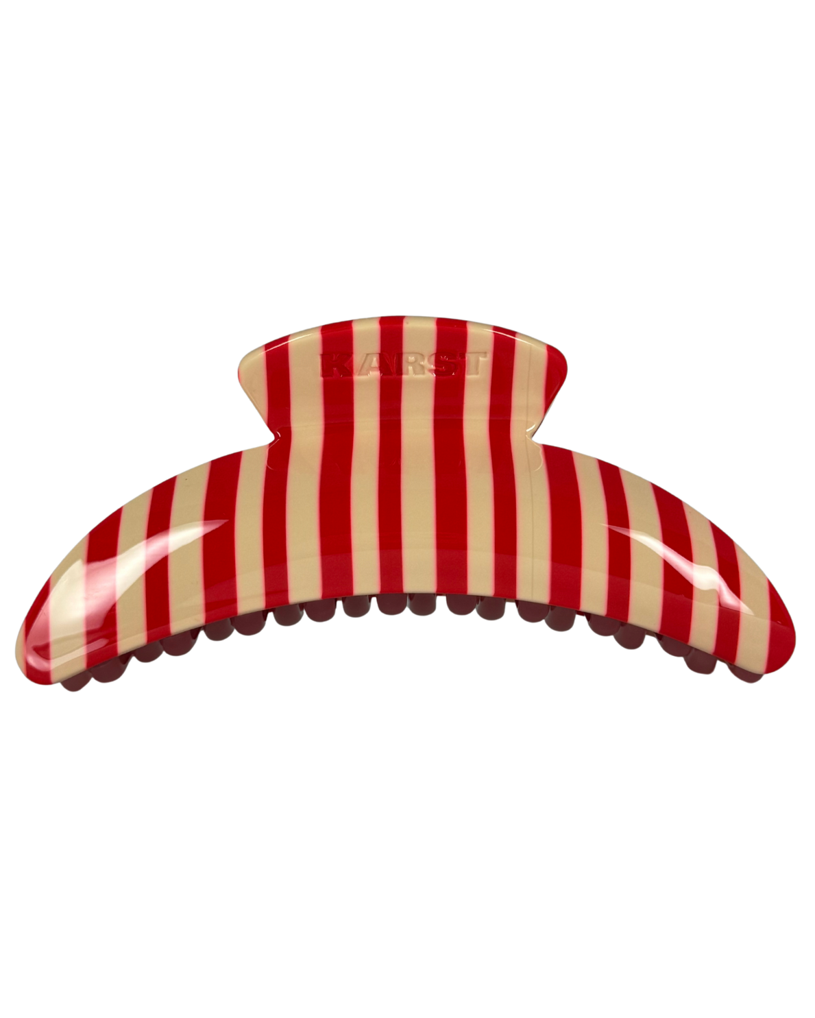 Red and beige striped hair clip on a white background