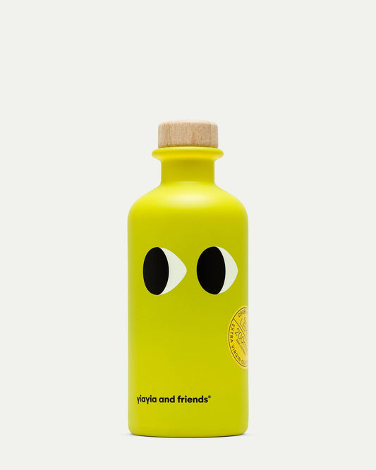 Yellow bottle with cartoon face design on a white background