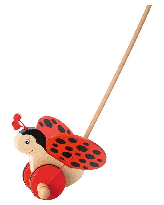 Wooden ladybug pull toy on a white background