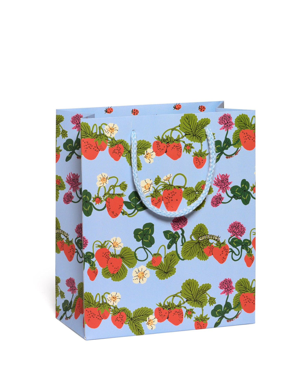 Gift bag with strawberry pattern on a light blue background