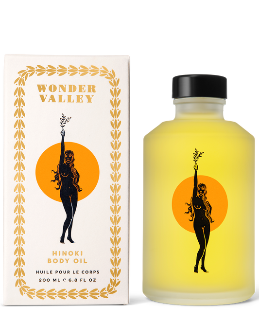 Bottle and packaging of Wonder Valley Hinoki Body Oil on a white background