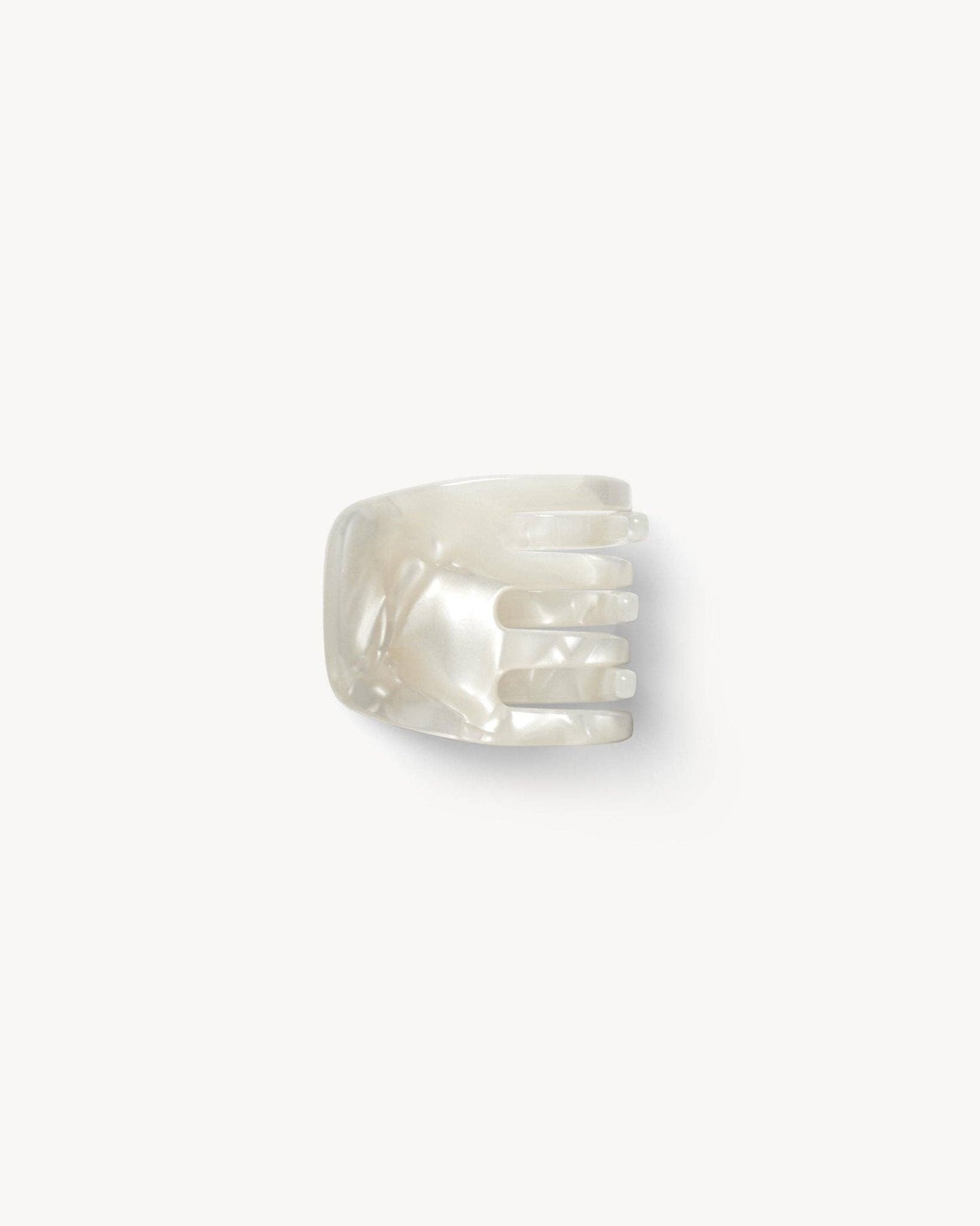 Pearl ring on a white background