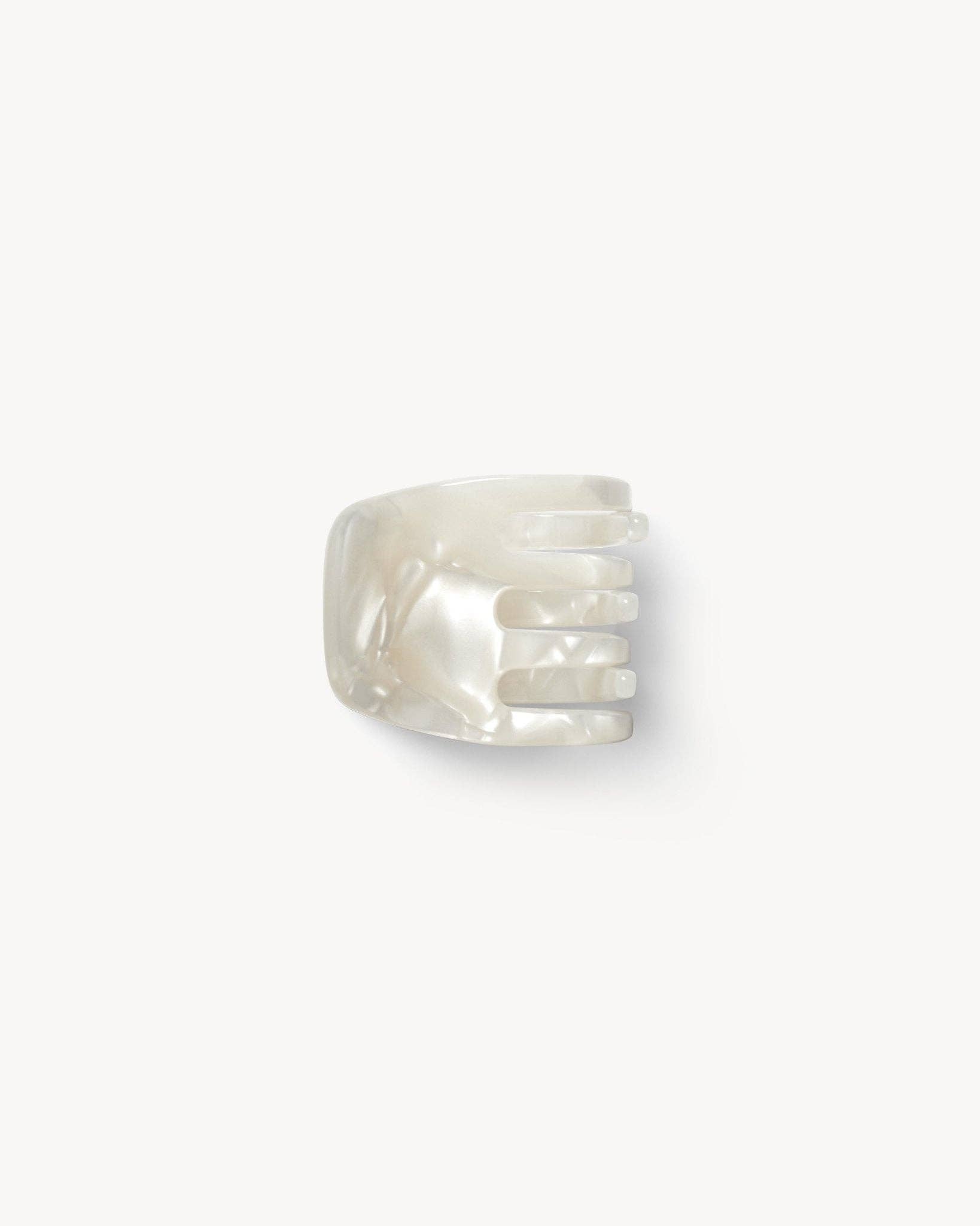 Pearl ring on a white background