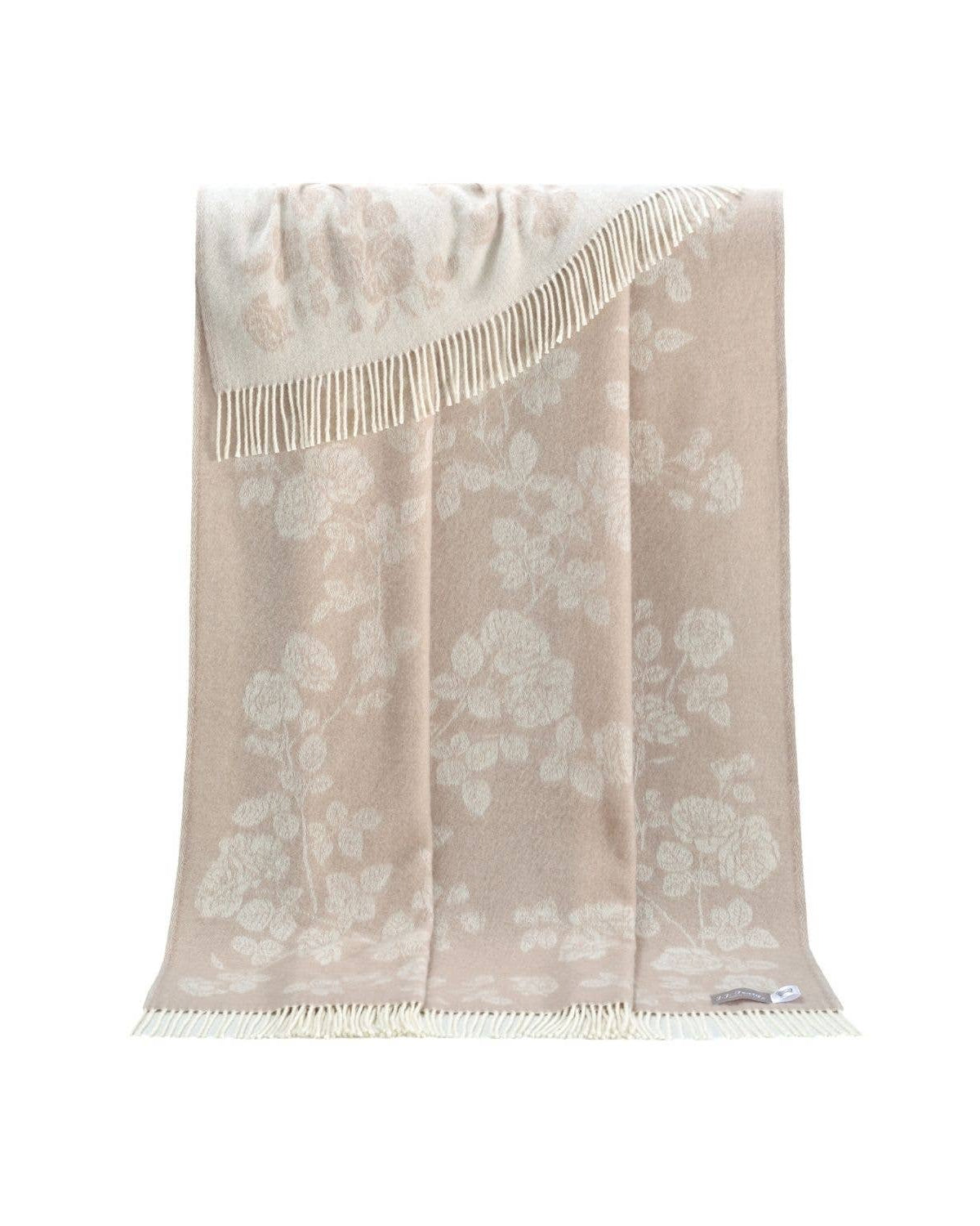 Beige floral patterned scarf with fringe on a white background