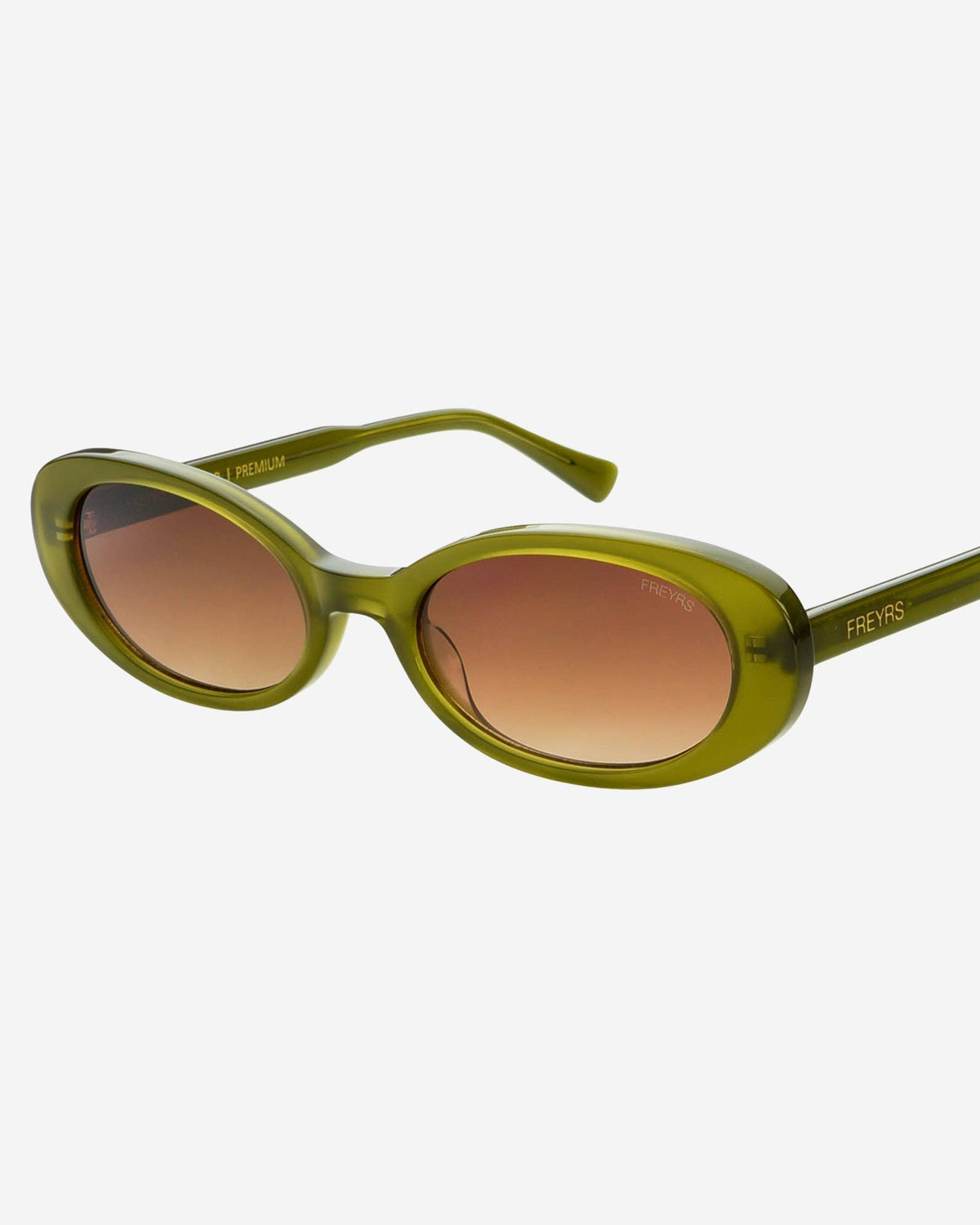 Green sunglasses with brown gradient lenses on a white background