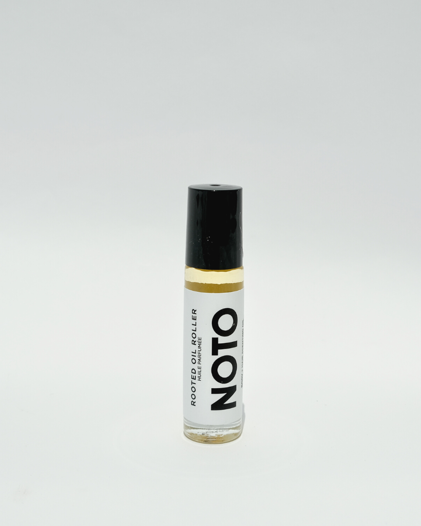 Roller bottle with 'Noto' label on a light gray background