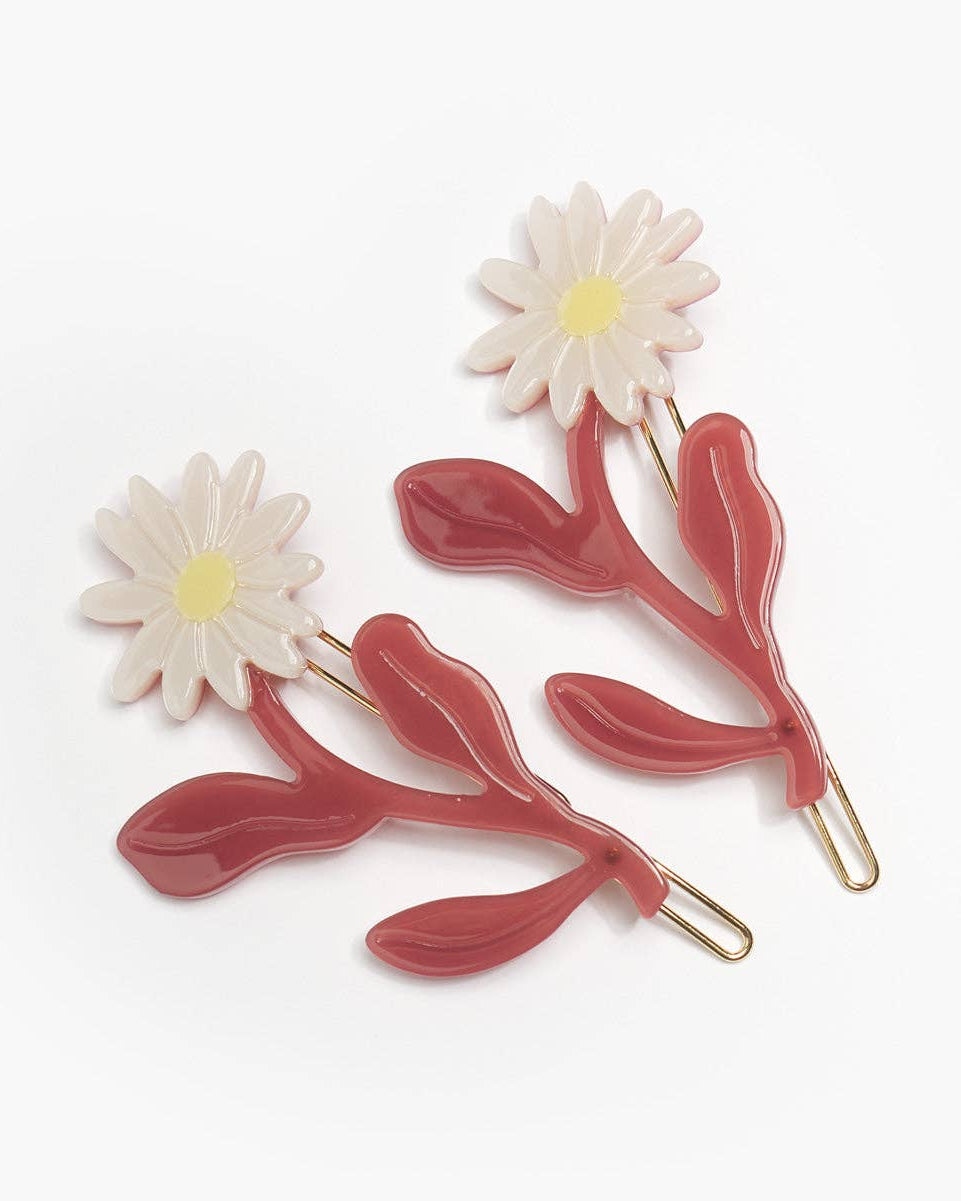 Floral hair pins with white flowers and red leaves on a white background