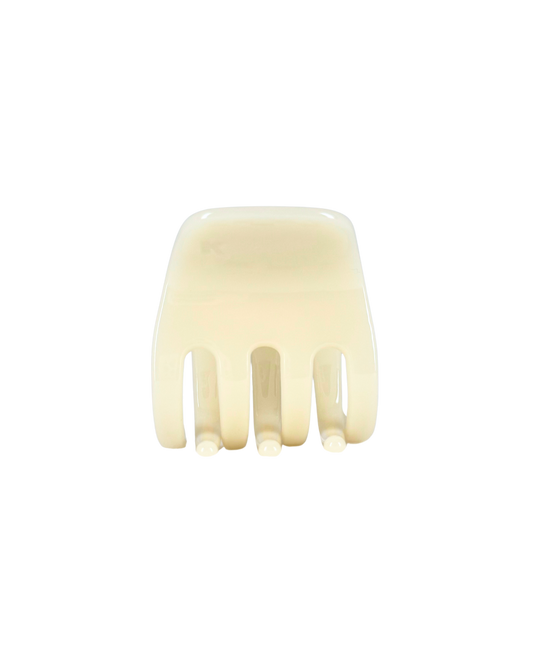 White hair comb on a white background