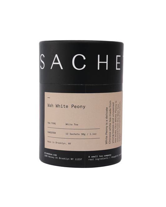 Sachet tea packaging with 'White Peony' on a white background
