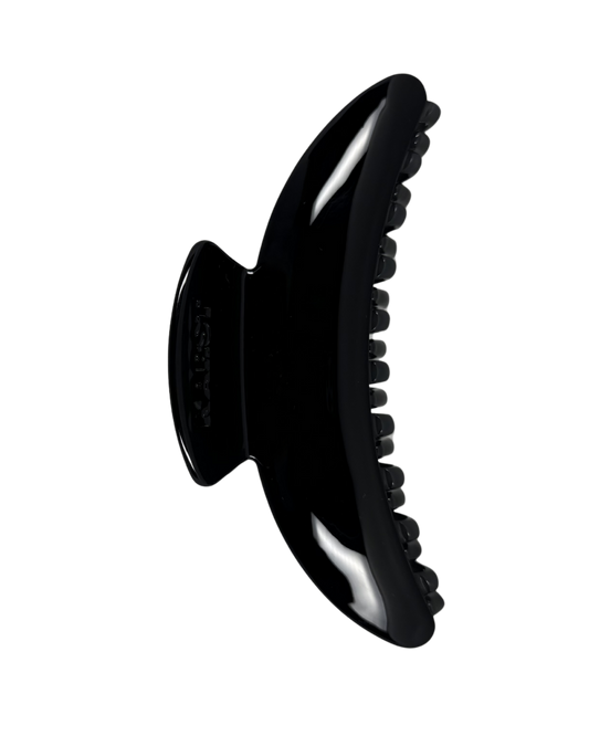 Black hair clip on a white background