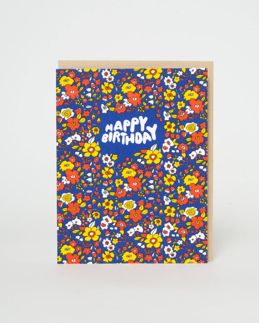 Greeting card with floral pattern and 'Happy Birthday' text on a white background