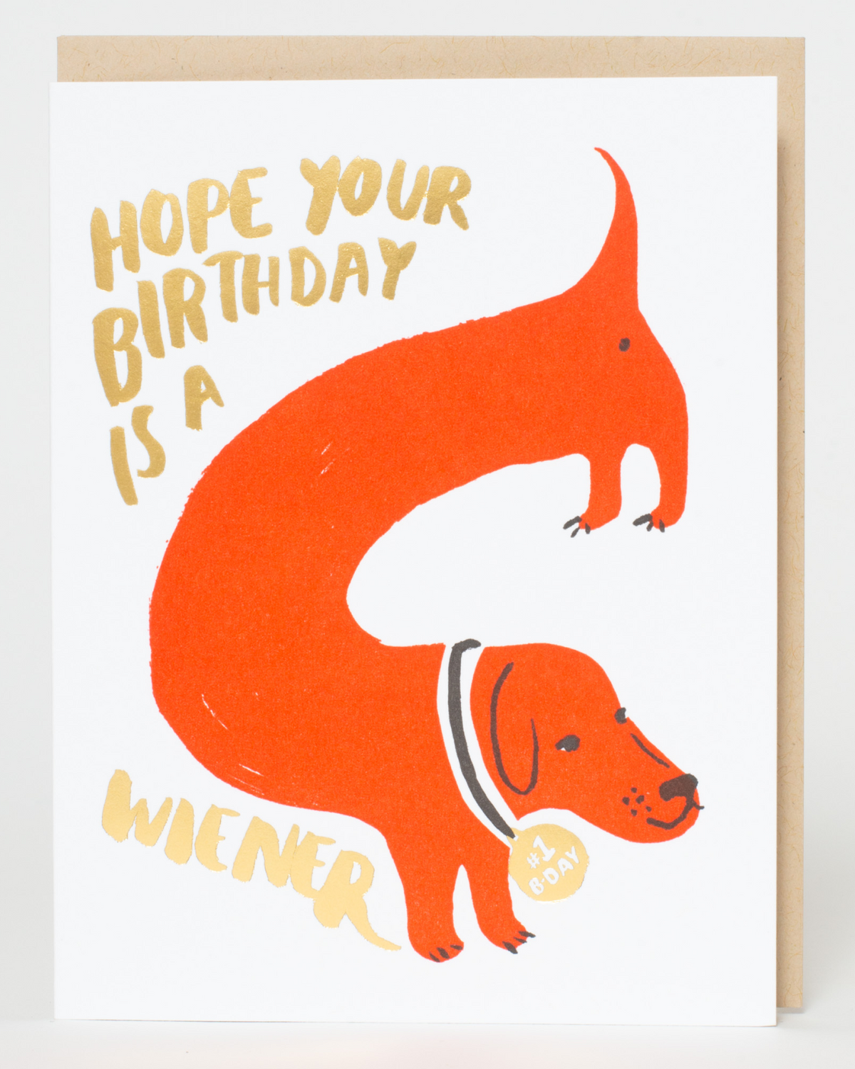 Greeting card with orange dachshund illustration and text 'Hope your birthday is a wiener' on a white background.