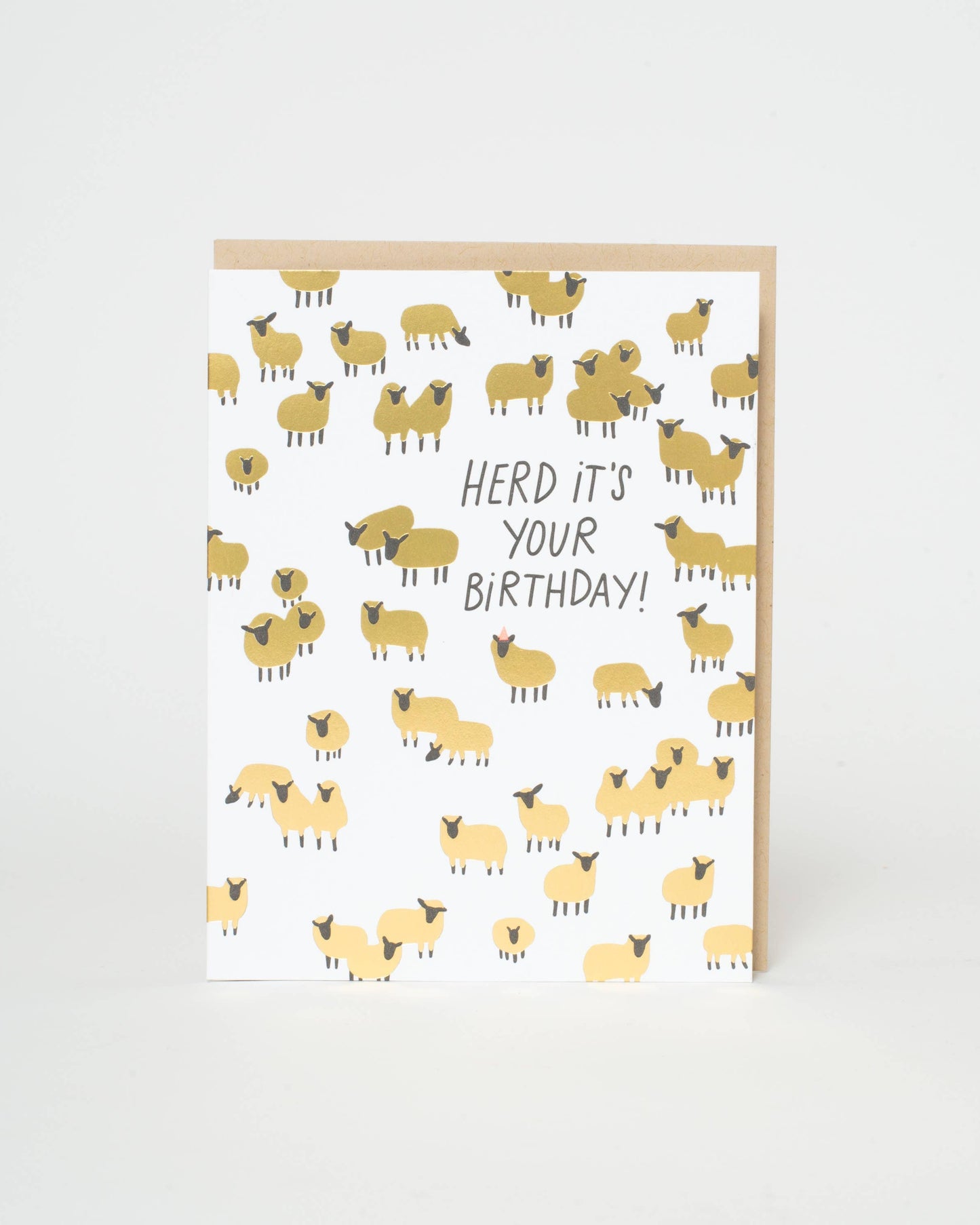 Greeting card with sheep pattern and 'Herd it's your birthday!' text on a white background