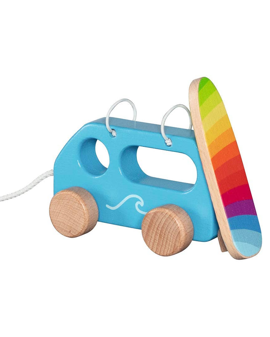 Toy car with a rainbow-shaped top on a white background
