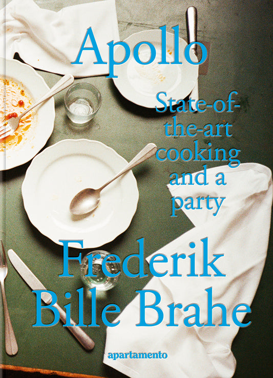 Book cover of 'Apollo' by Frederik Bille Brahe featuring a table setting with plates, cutlery, and glasses.