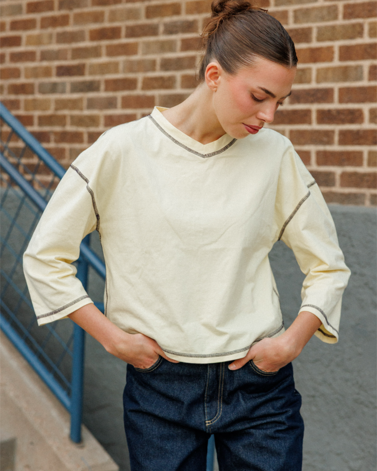 Model wearing the Sønderhaus August Tee in Yellow