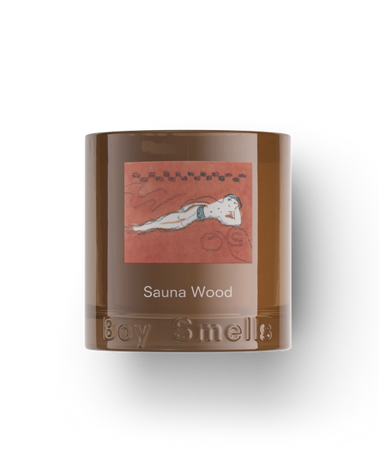 Scented candle container labeled 'Sauna Wood' with a decorative label on a white background