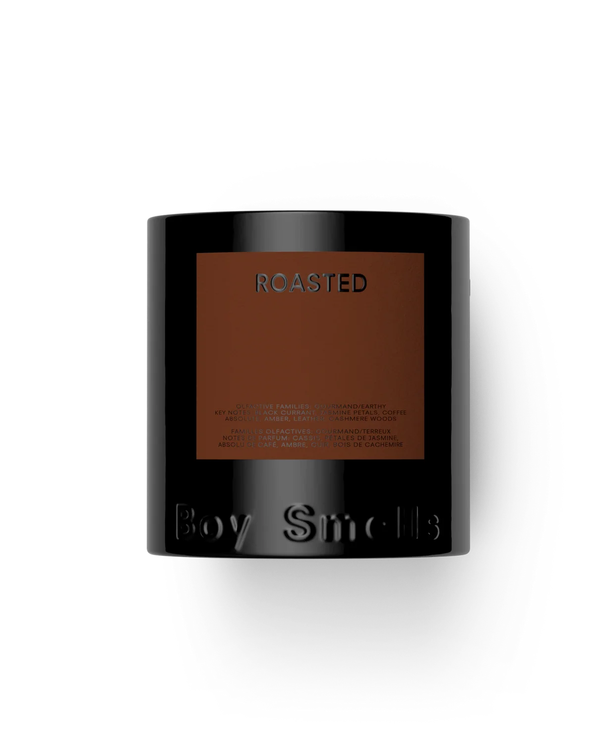 Black candle with 'Roasted' label on a white background