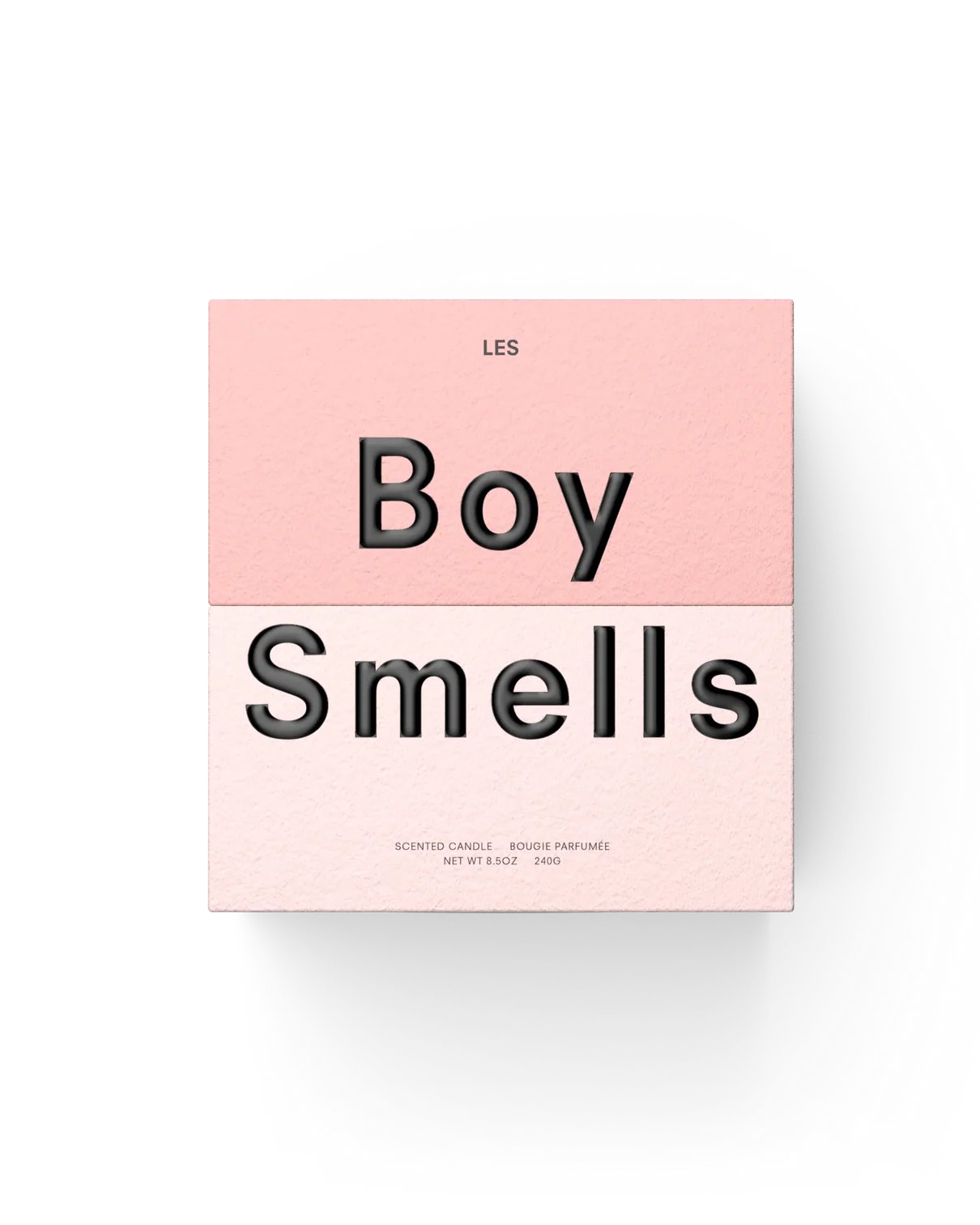 Product packaging with 'Boy Smells' text on a pink background