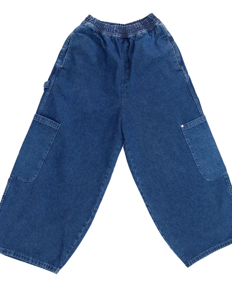 Blue denim pants on a white background