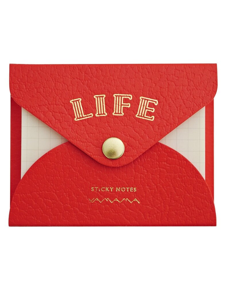 Red envelope-shaped sticky notes holder with 'LIFE' text on a white background