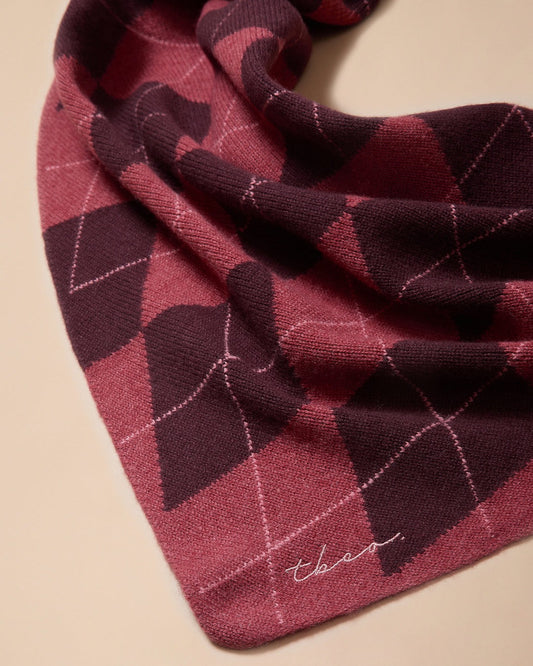 Large merino wool triangle scarf in Berry Argyle, flat lay