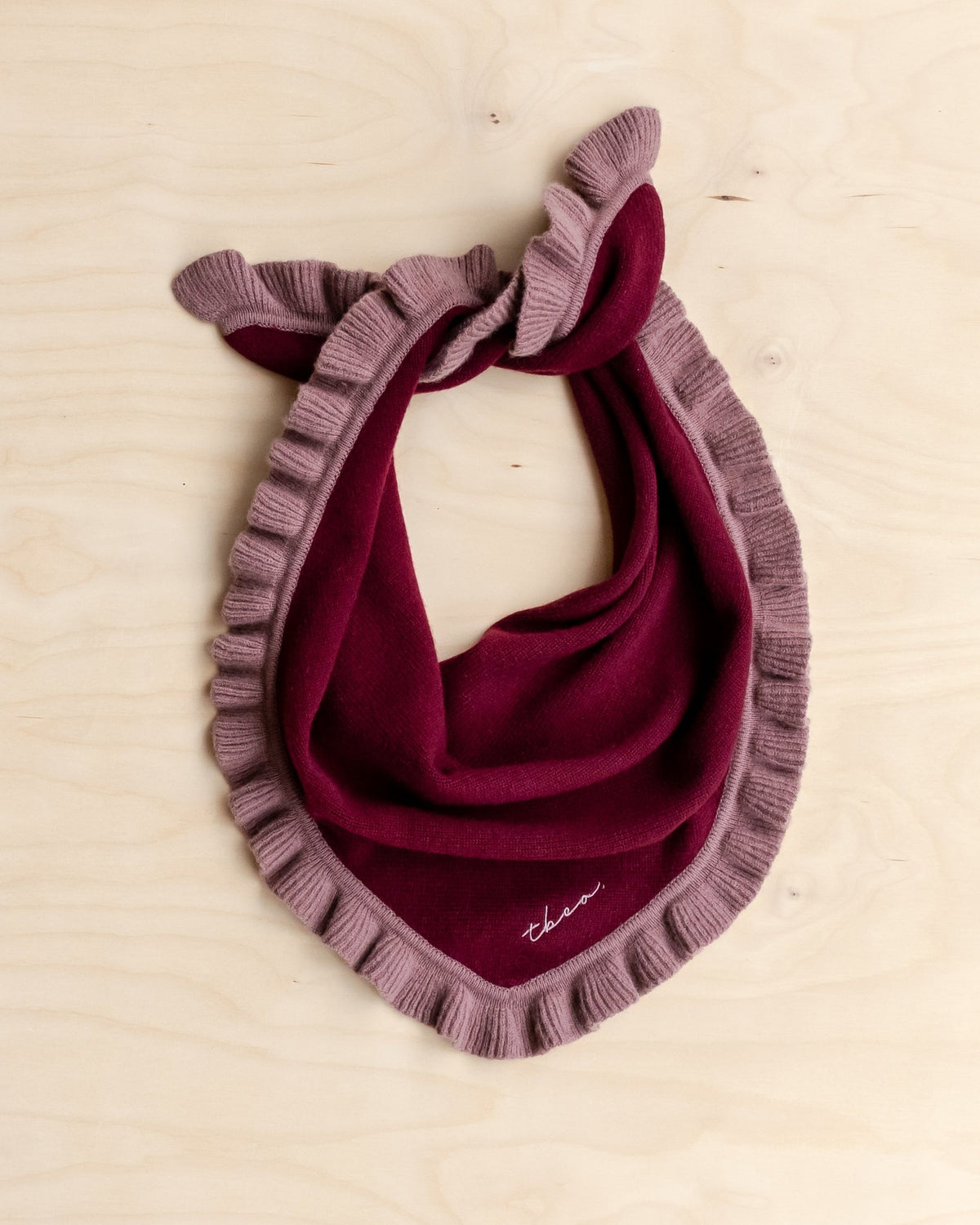 Merino wool triangle scarf in Burgundy Ruffle, flat lay