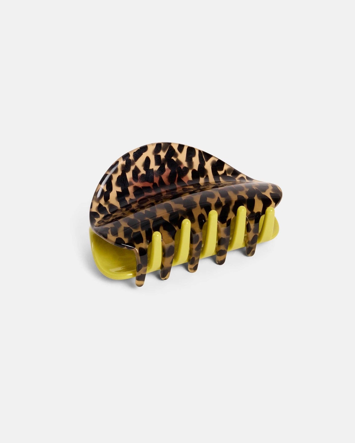 Leopard print hair clip with yellow base on a light gray background