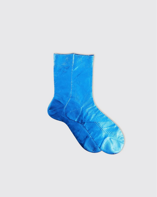 Blue sock on a light gray background