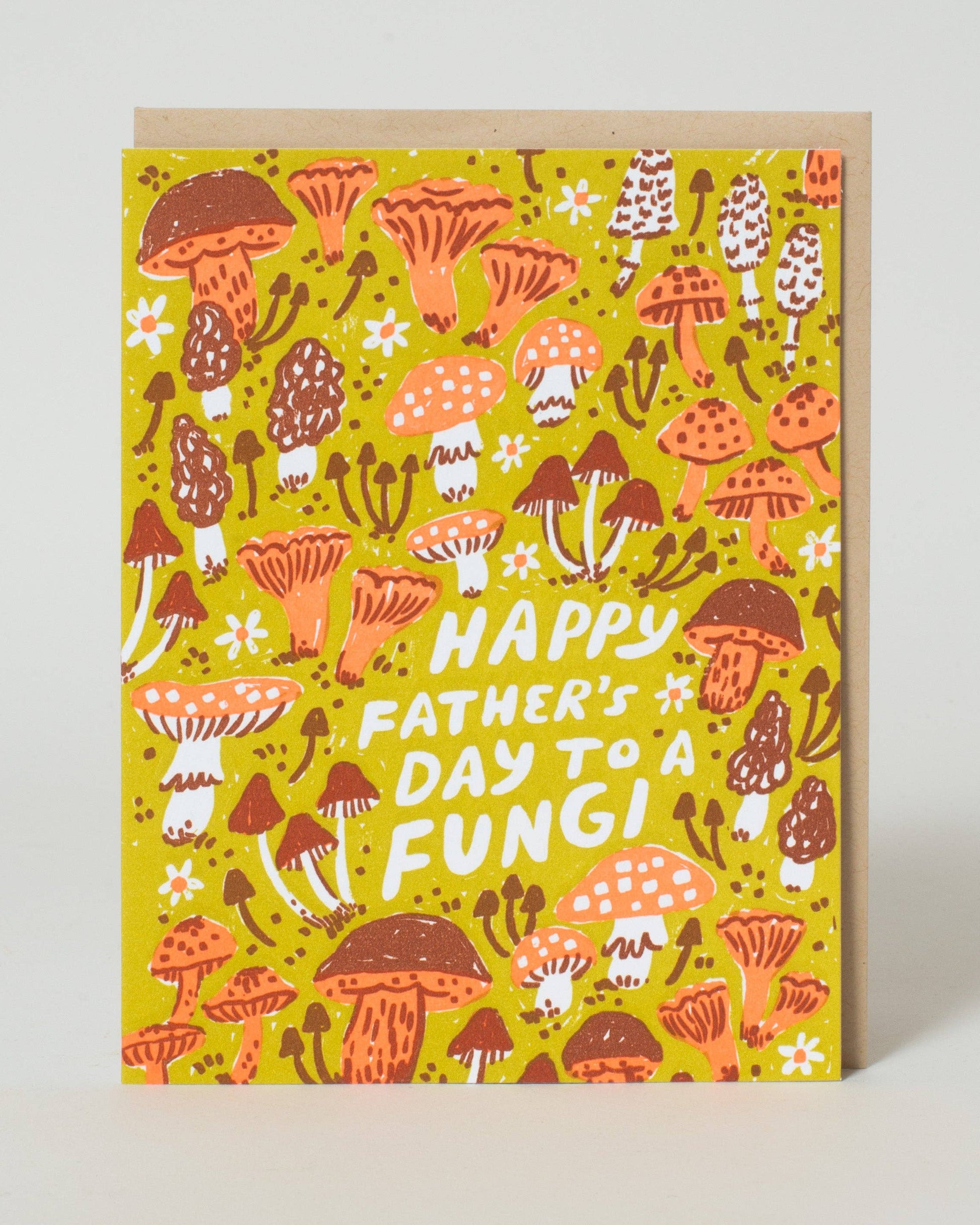 Greeting card with mushroom illustrations and 'Happy Father's Day to a Fungi' text on a yellow background.