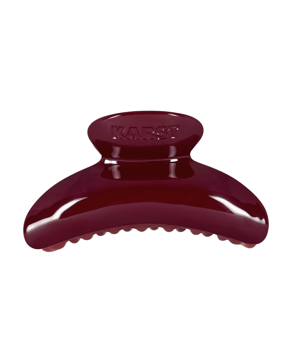 Maroon hair clip on a white background