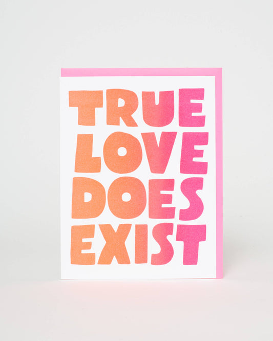 Card with 'True Love Does Exist' text in pink and orange on a white background