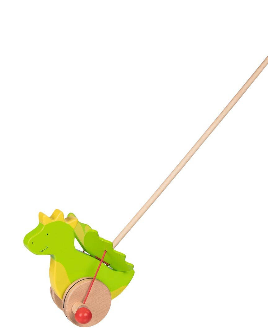 Toy pull dragon with a stick on a white background