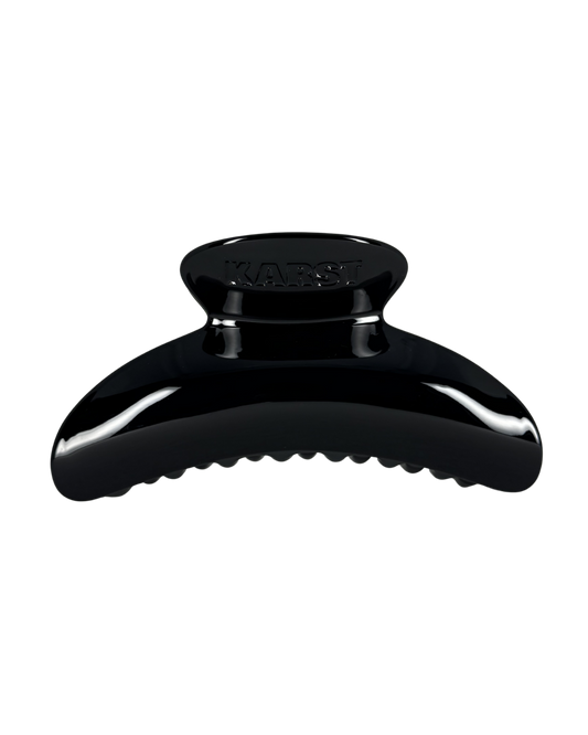Black hair clip on a white background