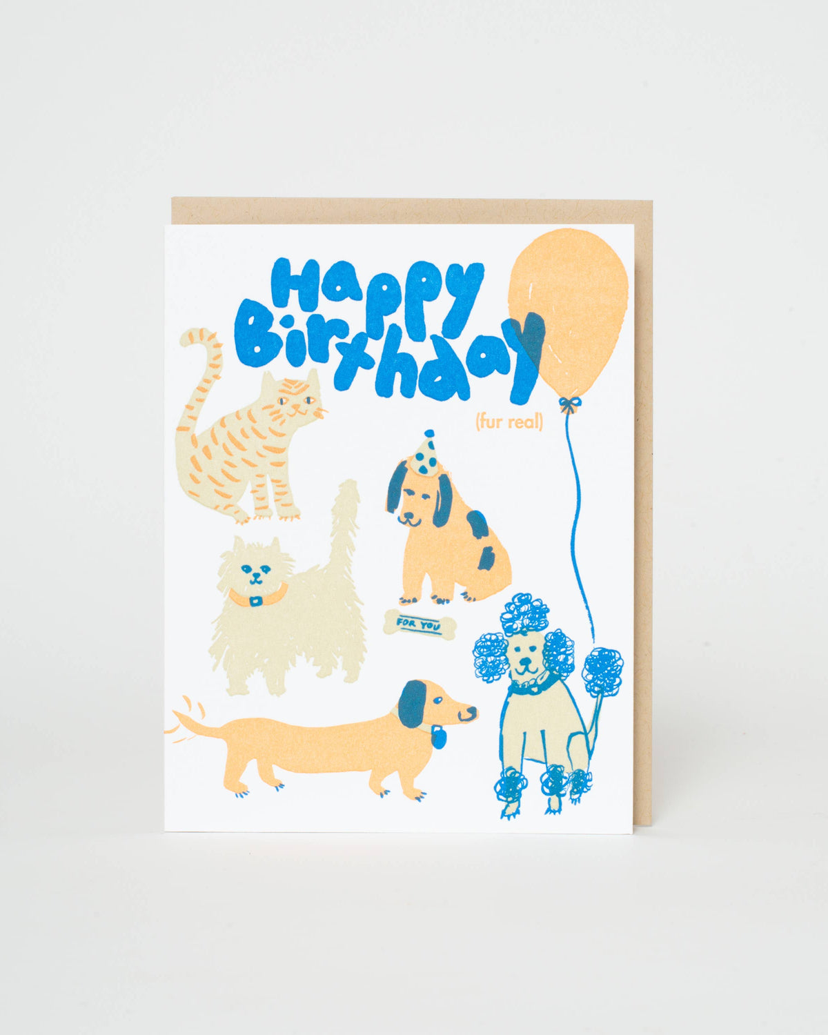 Birthday card with illustrations of dogs and a cat, featuring balloons and text on a white background.