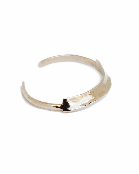 Gold bracelet on a white background