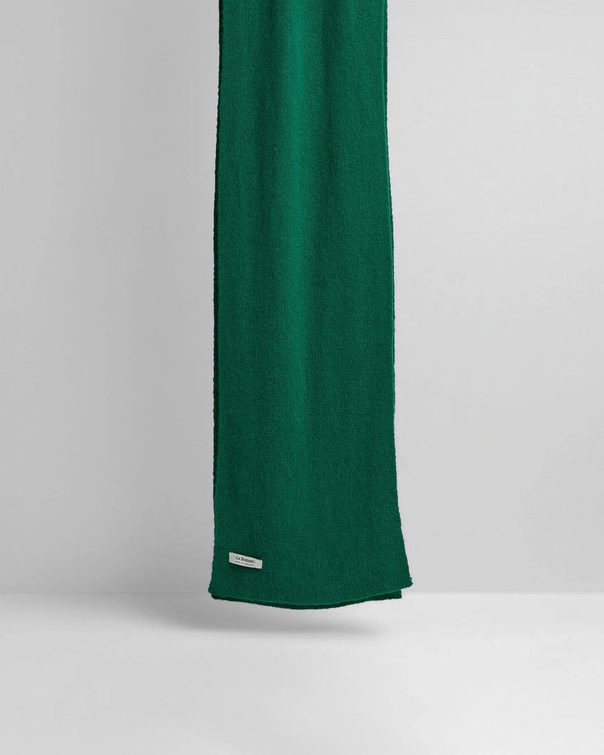 Green fabric on a gray background