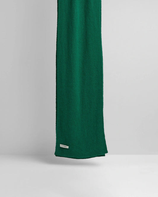 Green fabric on a gray background