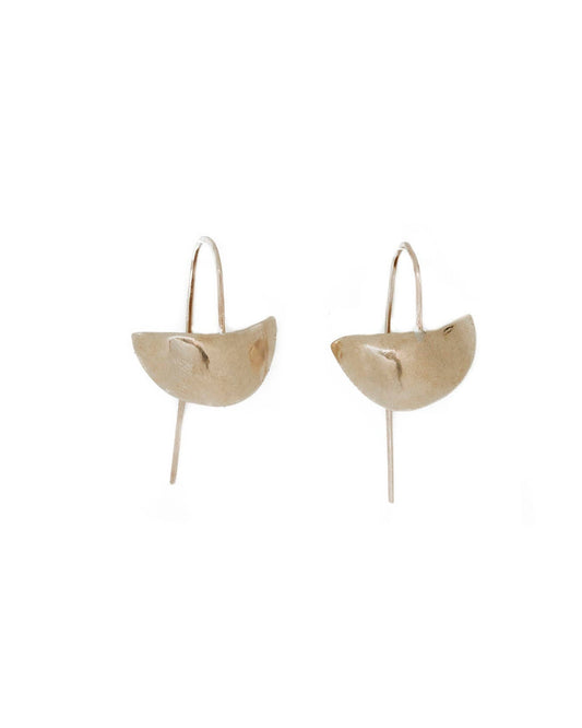 Pair of gold earrings on a white background
