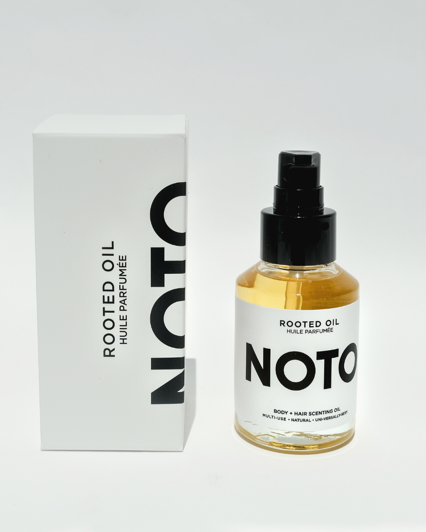 Bottle and box of NOTO Rooted Oil on a white background
