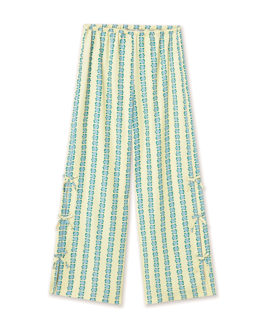 Striped pants with blue and green pattern on a white background