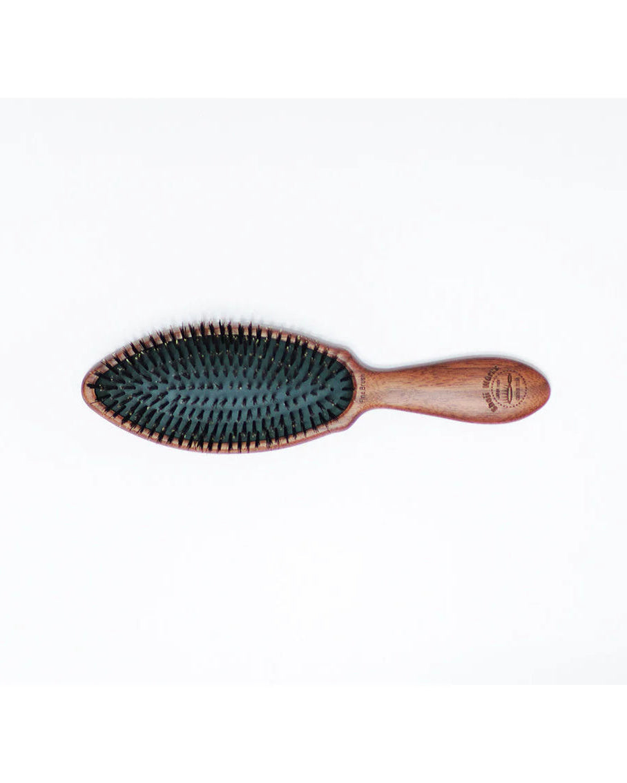 A wooden hairbrush with a dark green bristle pad and a reddish-brown wooden handle, shown on a plain white background.