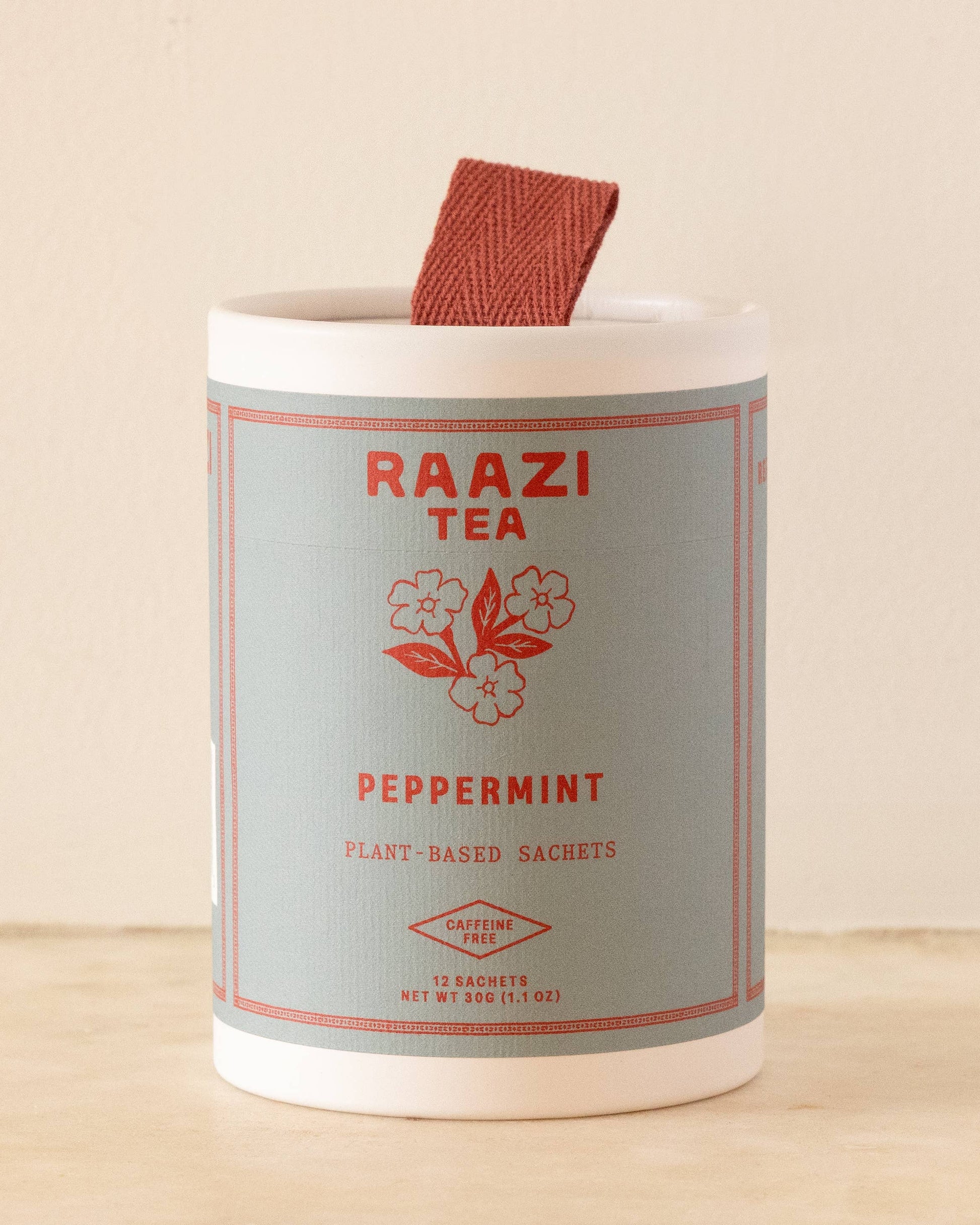 Raazi Tea peppermint tea packaging on a beige background