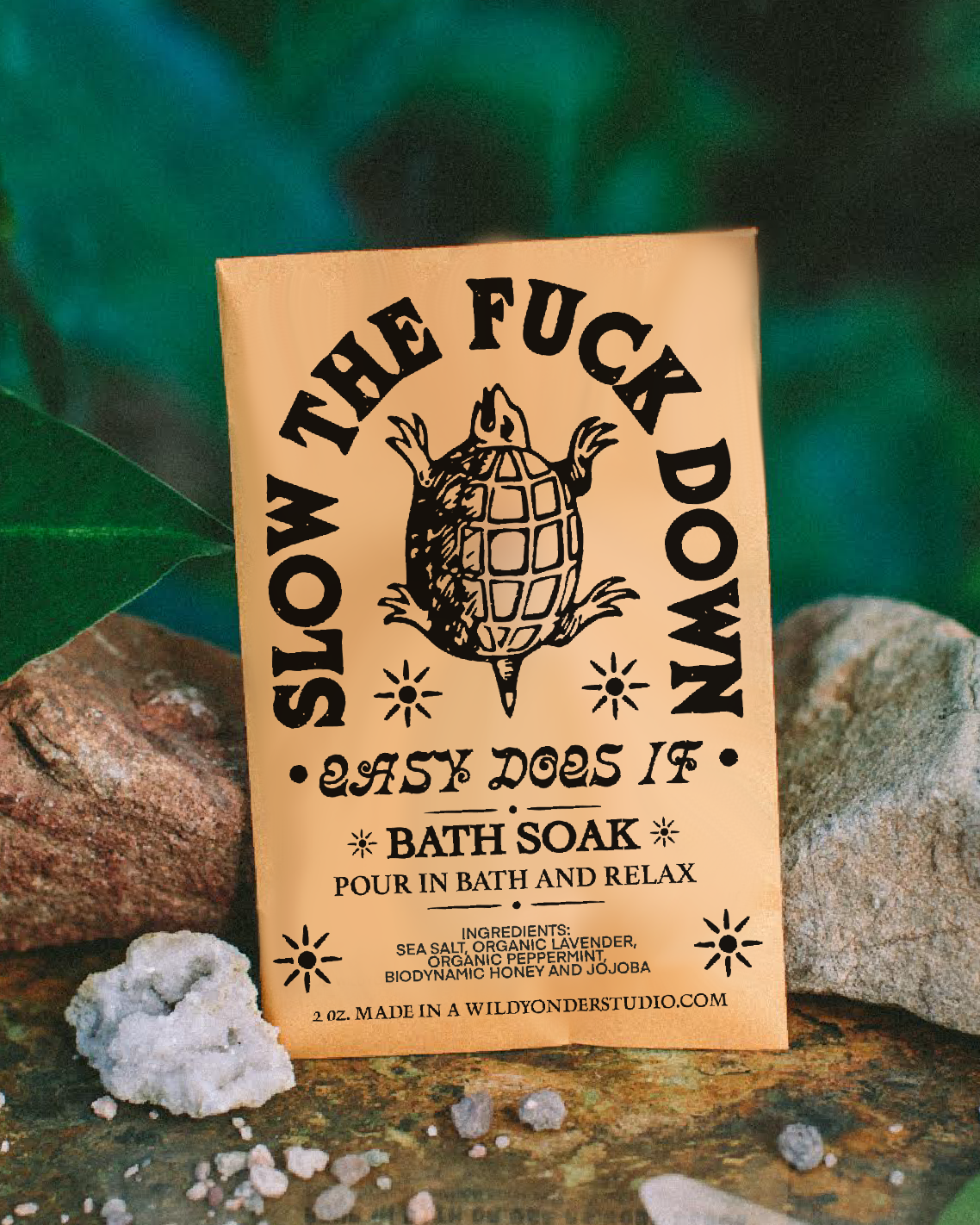 Bath soak packaging with text and illustration on a natural background