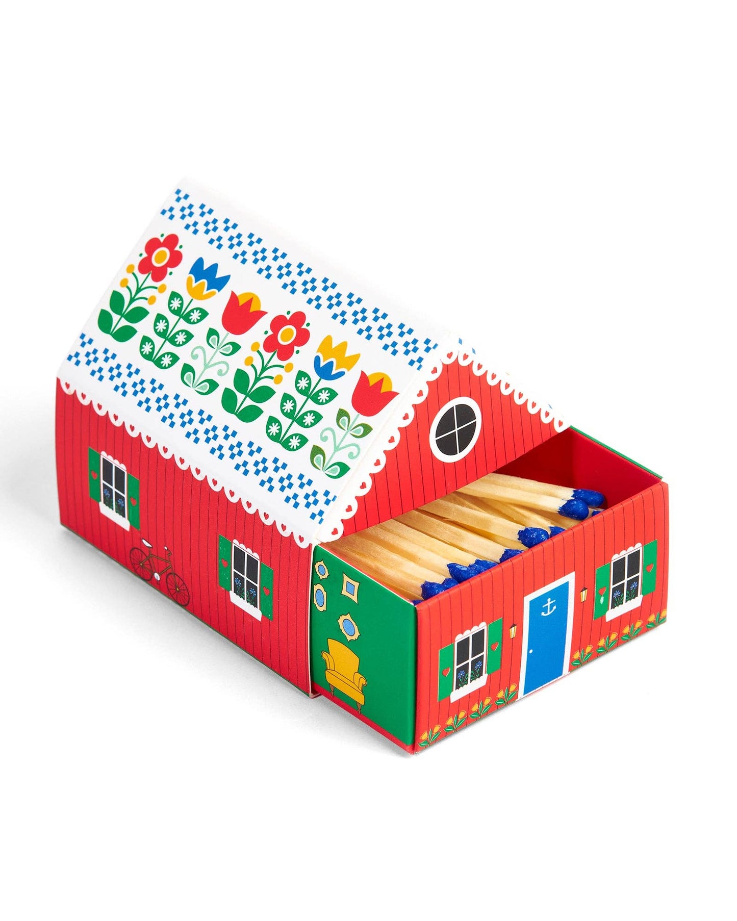 Colorful toy house with a red roof and floral design on a white background
