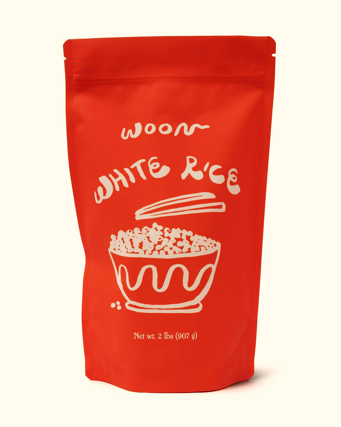 Red bag of white rice with white text and graphics on a white background